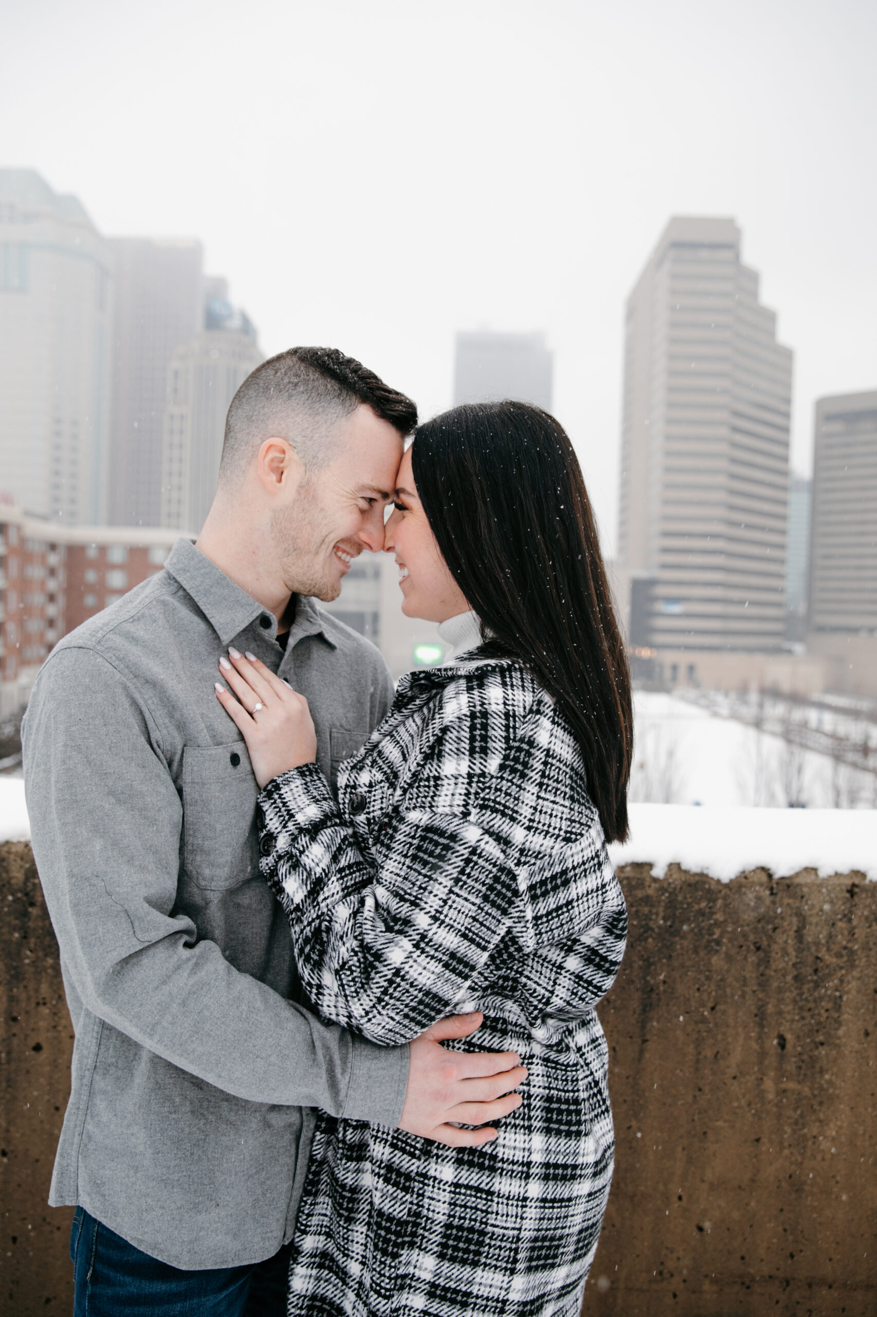 couple snowy engagement